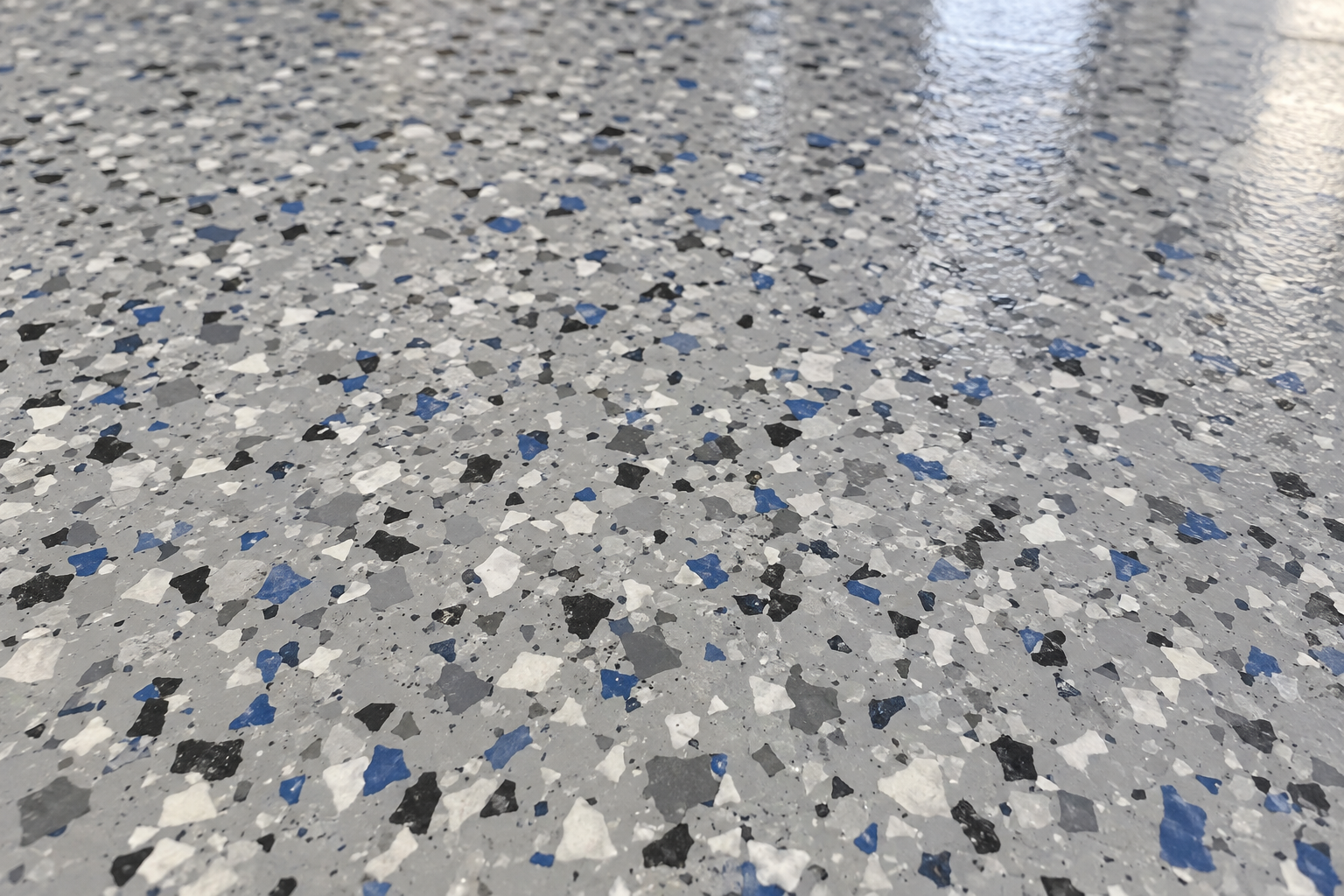 Close-up of flake epoxy flooring with multi-colored flakes